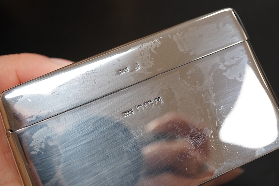 An Elizabeth II silver mounted rectangular cigarette box, with R.A.F. related engraved inscription, Sheffield, 1957, 17.7cm.